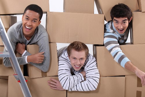 Moving van crew assessing safety before a job starts