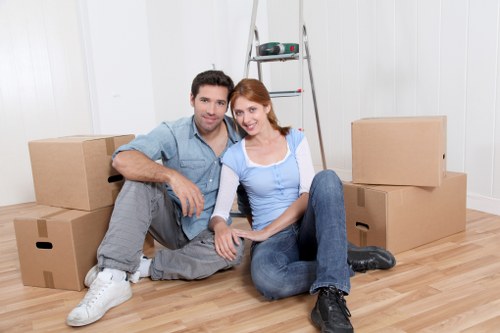 Local office movers handling access and loading on a South London street