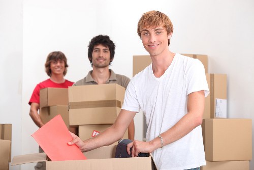 Local team collecting sofas and chairs from a Dulwich home